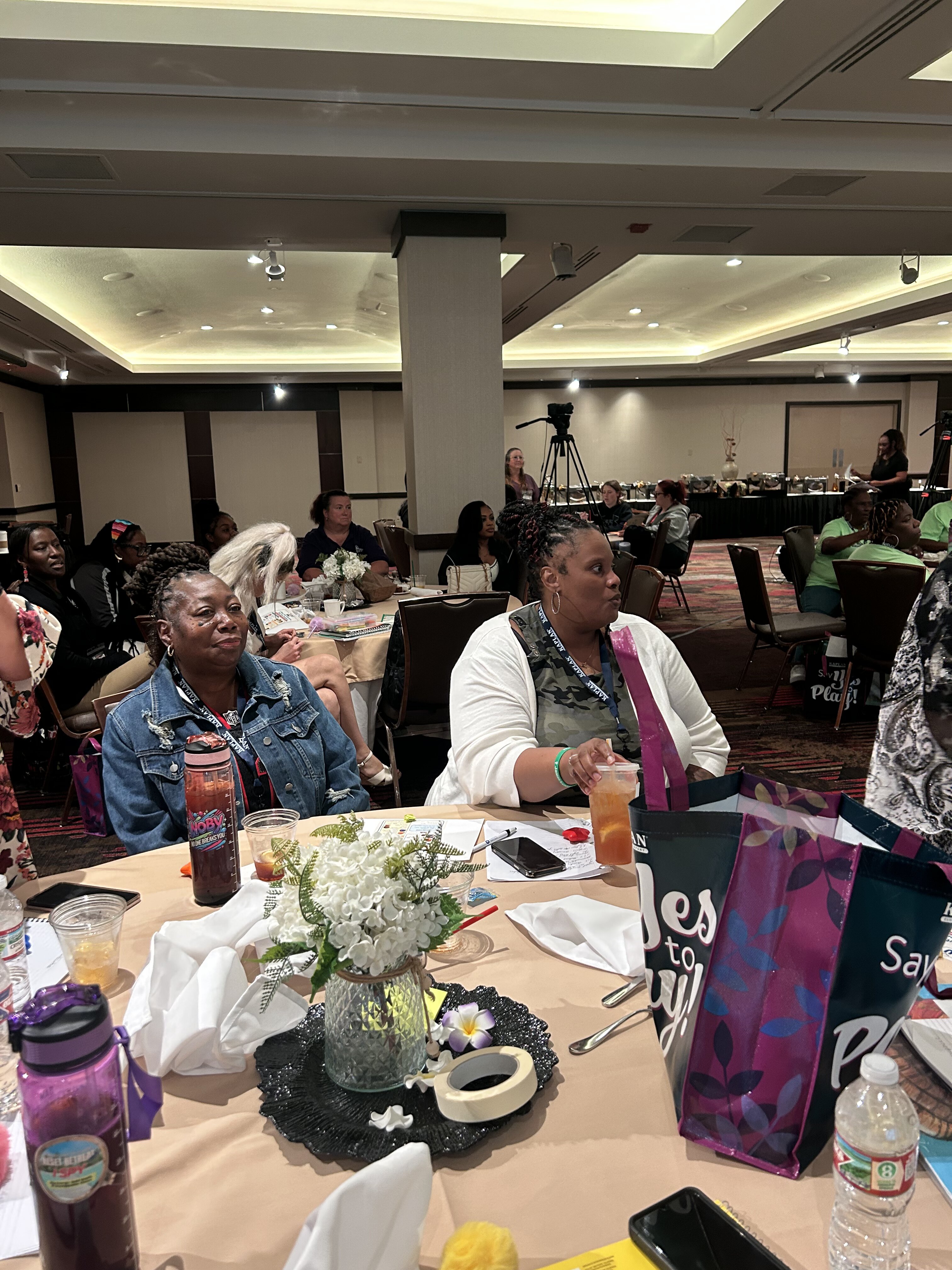 Staff attending a childcare professional development conference