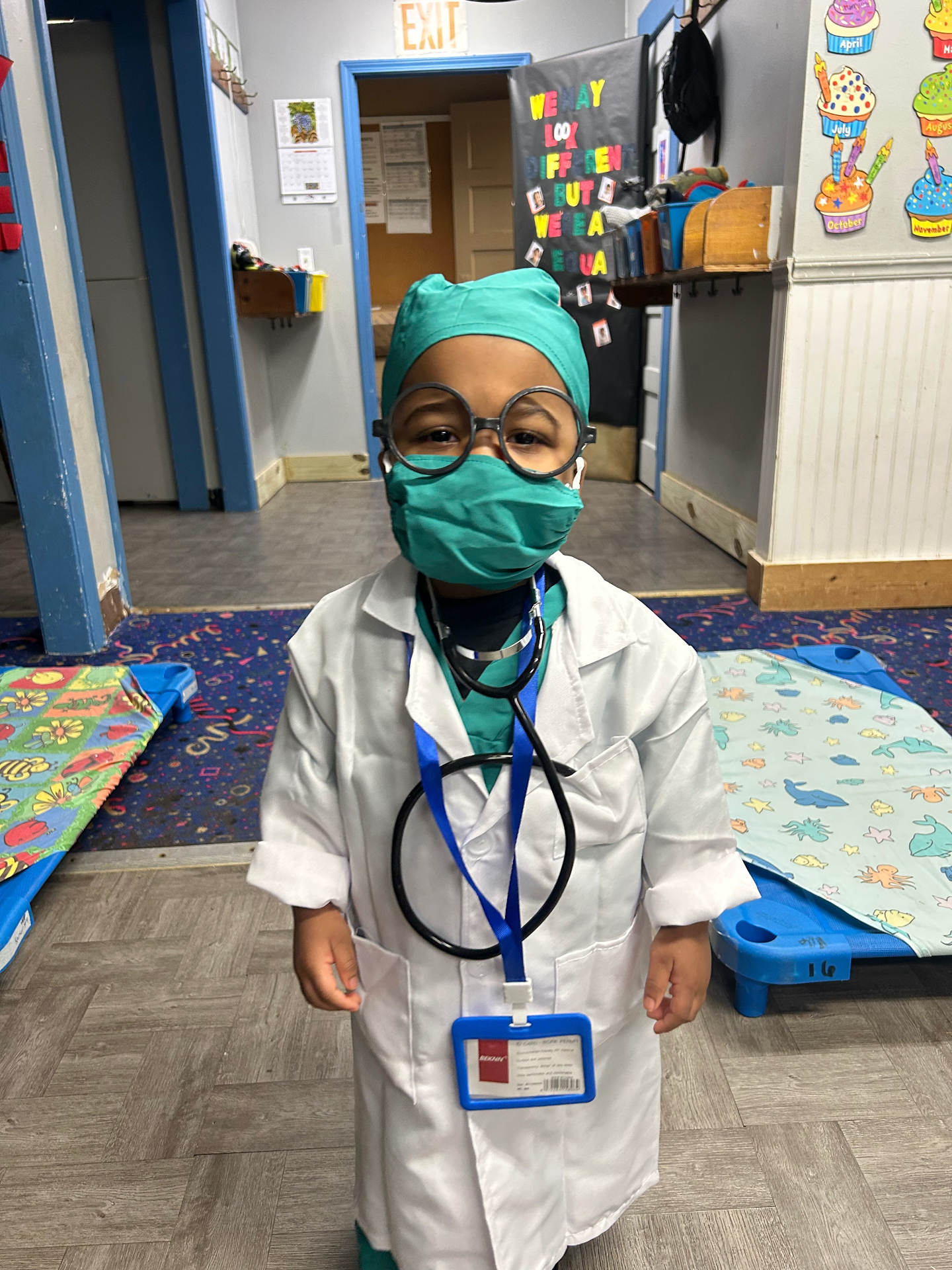 A child dressed as a doctor during imaginative play
