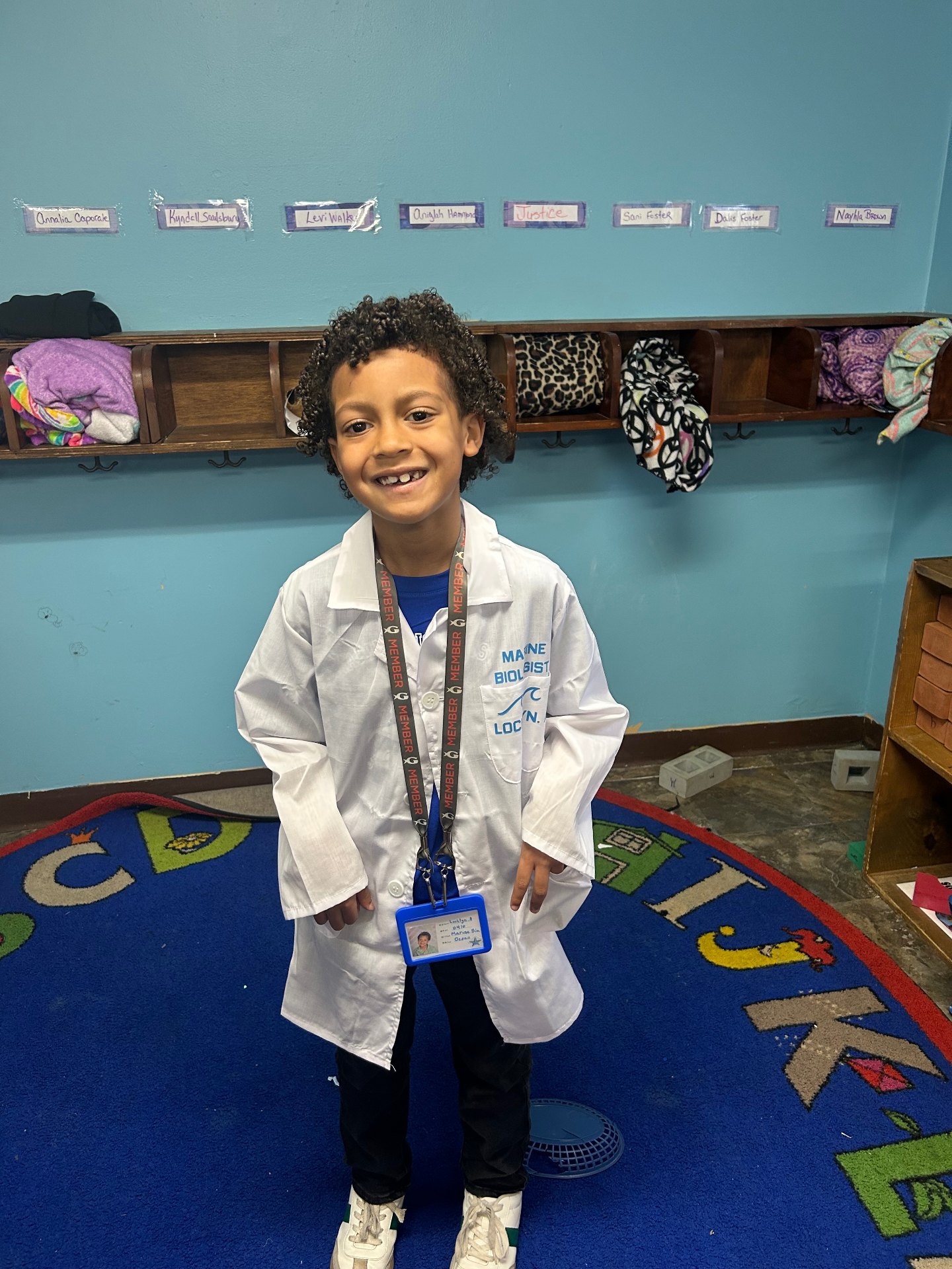 A child dressed as a marine biologist during career day